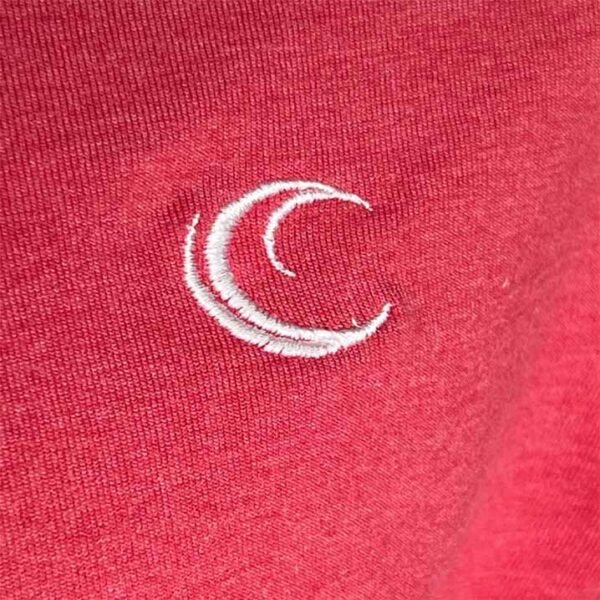 Embroidered Clean Water logo on red T-tshirt